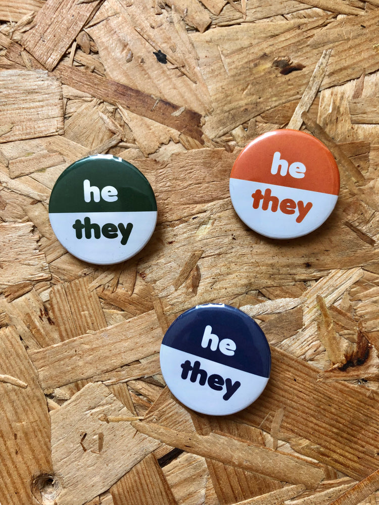 
            
                Load image into Gallery viewer, He/They Two-Tone Pronoun Badges 32mm
            
        