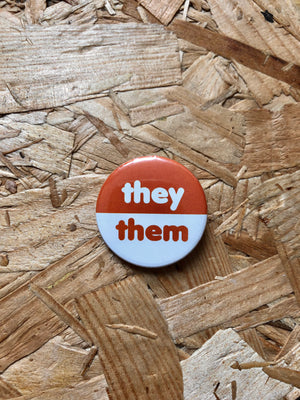 
            
                Load image into Gallery viewer, They/Them Two-Tone Pronoun Badges 32mm
            
        