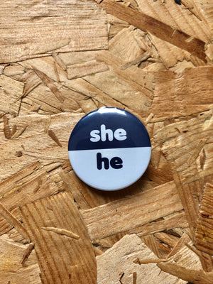 
            
                Load image into Gallery viewer, She/He Two-Tone Pronoun Badges 32mm
            
        