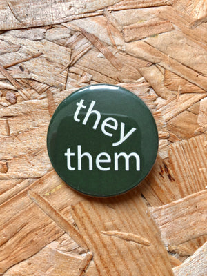 
            
                Load image into Gallery viewer, They/Them Diagonal Pronoun Badges 32mm
            
        